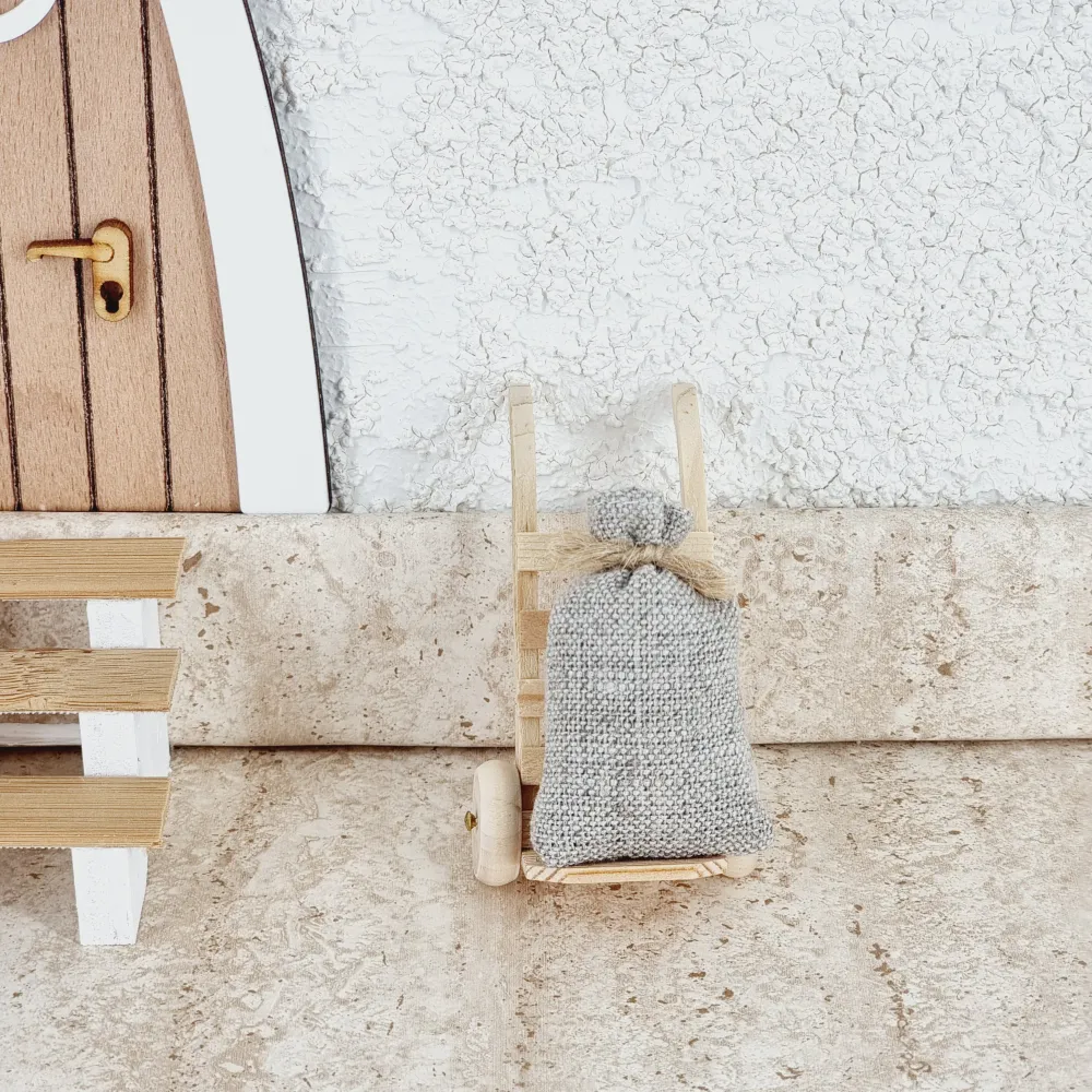 Wichtel Hubkarre mit Sack