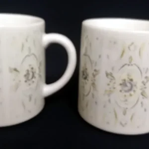 2er Set KAFFEETASSEN "100 Jahre" - Porzellan, Flora Rosenblüten Abstrakt Geometrisch Motiv Dekor