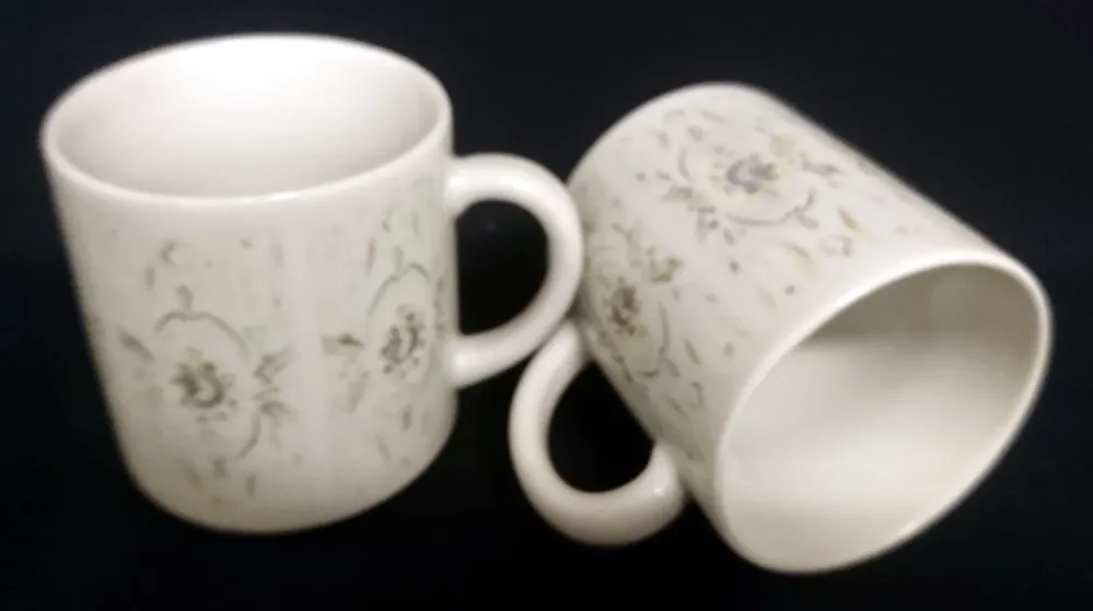 2er Set KAFFEETASSEN "100 Jahre" - Porzellan, Flora Rosenblüten Abstrakt Geometrisch Motiv Dekor