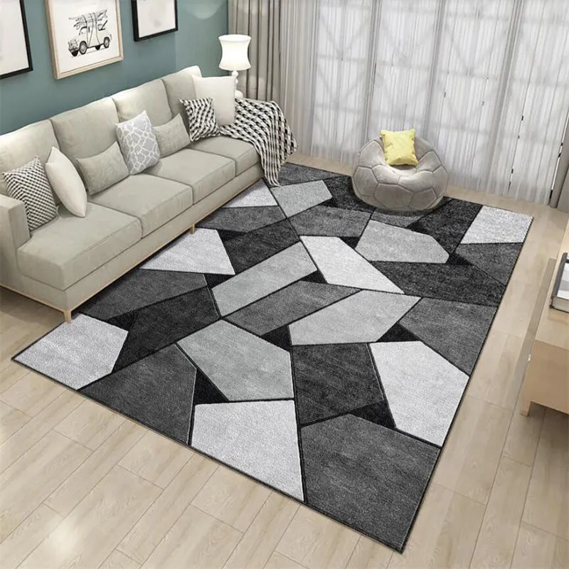 Moderner Wohnzimmerteppich schwarzem und grauem Farbblockmuster mit unregelmäßiger Form, maschinenwaschbarer Teppich aus P...