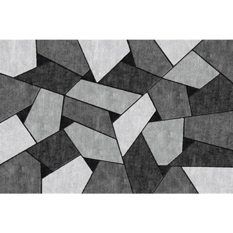 Moderner Wohnzimmerteppich schwarzem und grauem Farbblockmuster mit unregelmäßiger Form, maschinenwaschbarer Teppich aus P...