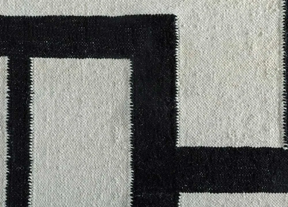 Wollteppich - 240 x 150 cm - schwarz-weiß