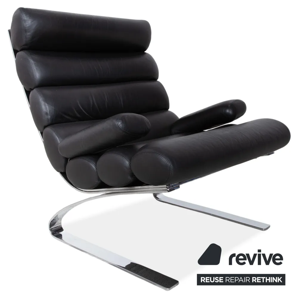 Cor Sinus Leder Chrom Sessel Schwarz inkl. Hocker Freischwinger